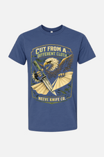 Blue t-shirt featuring a vintage-style graphic of an eagle clutching a knife and a torn piece of cloth, with the text “Cut From a Different Cloth” above and “Neeve Knife Co.” below.