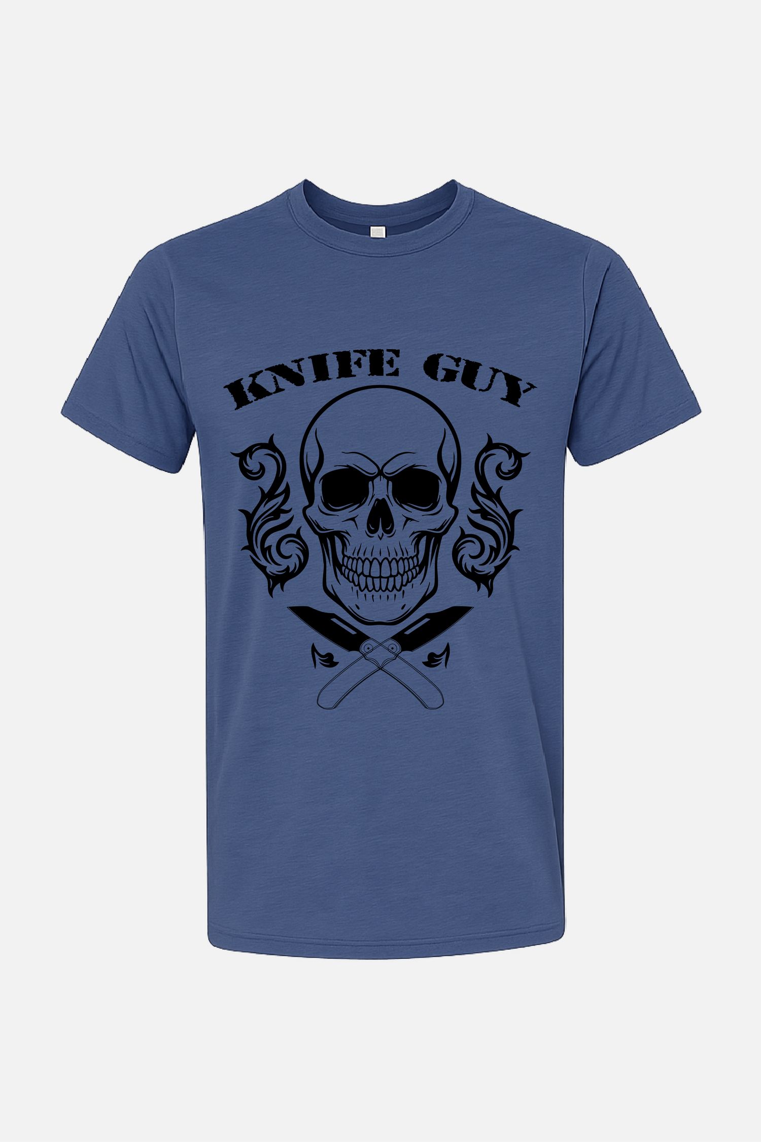 Blue t-shirt featuring a black graphic of a skull with ornate flourishes, crossed knives beneath it, and the words “Knife Guy” printed above.